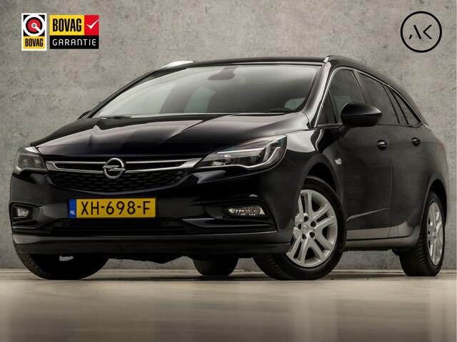 Opel ASTRA Sports Tourer 1.0 Sport (APPLE CARPLAY, GROOT NAVI, CLIMATE, TREKHAAK, SPORTSTOELEN, GETINT GLAS, PARKEERSENSOREN, NIEUWSTAAT)