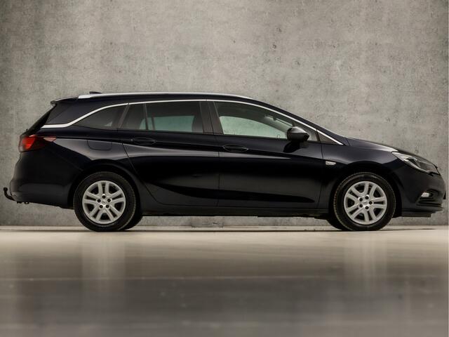 Opel ASTRA Sports Tourer 1.0 Sport (APPLE CARPLAY, GROOT NAVI, CLIMATE, TREKHAAK, SPORTSTOELEN, GETINT GLAS, PARKEERSENSOREN, NIEUWSTAAT)