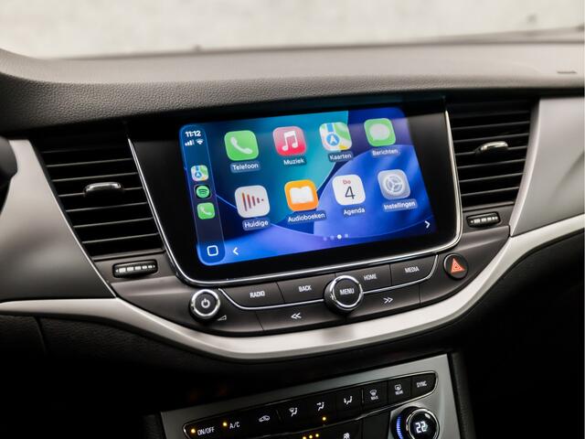 Opel ASTRA Sports Tourer 1.0 Sport (APPLE CARPLAY, GROOT NAVI, CLIMATE, TREKHAAK, SPORTSTOELEN, GETINT GLAS, PARKEERSENSOREN, NIEUWSTAAT)