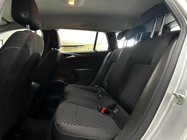 Opel ASTRA Sports Tourer 1.0 Turbo Business/ Apple + Android/ DAB+/ Navi/ Airco/ Cruise/ Elek. pakket/ Isofix/ Bluetooth/ Armsteun/ Multi. LEDER. Stuur/ PDC Achter.