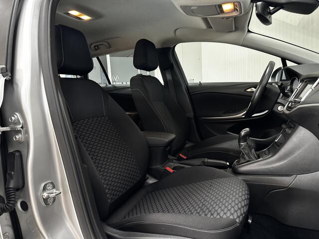 Opel ASTRA Sports Tourer 1.0 Turbo Business/ Apple + Android/ DAB+/ Navi/ Airco/ Cruise/ Elek. pakket/ Isofix/ Bluetooth/ Armsteun/ Multi. LEDER. Stuur/ PDC Achter.