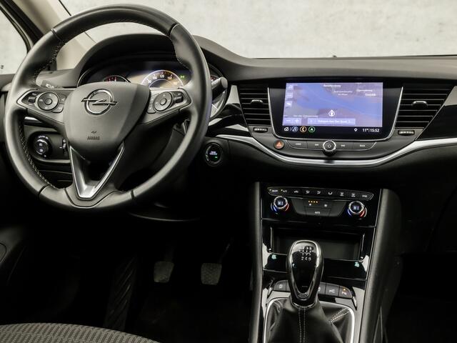 Opel ASTRA Sports Tourer 1.2 Elegance 146Pk (APPLE CARPLAY, GROOT NAVI, CLIMATE, CAMERA, LEDER, GETINT GLAS, SPORTSTOELEN, KEYLESS, LANE ASSIST, LED KOPLAMPEN, DAB+, LM VELGEN, NIEUWSTAAT)