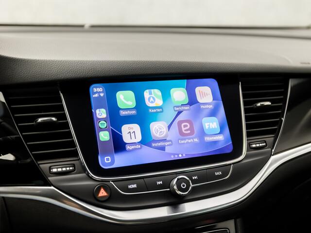 Opel ASTRA Sports Tourer 1.2 Elegance 146Pk (APPLE CARPLAY, GROOT NAVI, CLIMATE, CAMERA, LEDER, GETINT GLAS, SPORTSTOELEN, KEYLESS, LANE ASSIST, LED KOPLAMPEN, DAB+, LM VELGEN, NIEUWSTAAT)