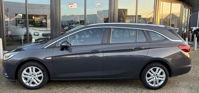 Opel ASTRA Sports Tourer 1.0 Business+ | Nette Staat! | NL AUTO | Trekhaak | Onderhoudshistorie | 2 Sleutels | Parkeersensoren | Climate Control | Cruise Control |