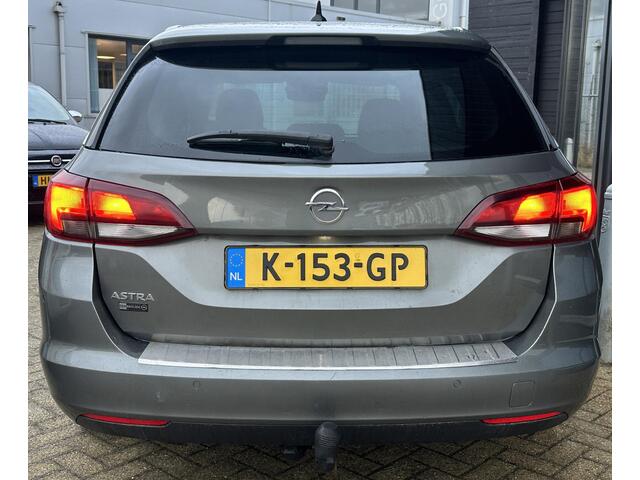 Opel ASTRA Sports Tourer 1.4 Turbo 120 Jaar Edition 150PK | AUTOMAAT | ZEER NETTE STAAT | Trekhaak | Stoel en Stuur Verwarming | APK tot 29-04-2027 |