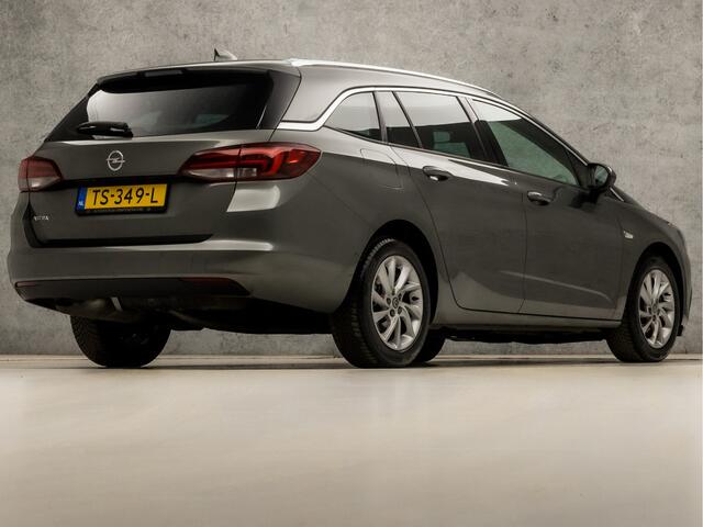Opel ASTRA Sports Tourer 1.0 Innovation Sport (APPLE CARPLAY, GROOT NAVI, CLIMATE, LEDER, GETINT GLAS, SPORTSTOELEN, CAMERA, LM VELGEN, LED KOPLAMPEN, NIEUWSTAAT)