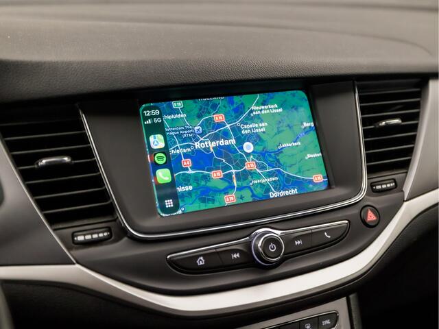 Opel ASTRA Sports Tourer 1.2 Sport (APPLE CARPLAY, NAVIGATIE, CLIMATE, CAMERA, SPORTSTOELEN, LM VELGEN, CRUISE, NIEUWSTAAT)