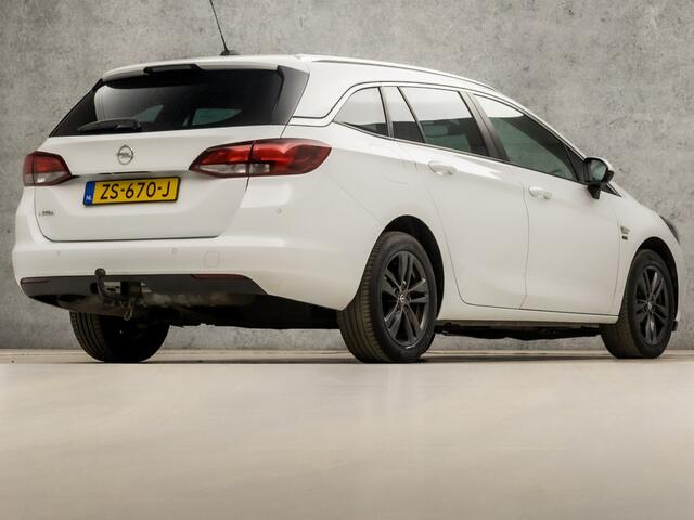 Opel ASTRA Sports Tourer 1.0 Turbo 120 Jaar Edition (APPLE CARPLAY, NAVIGATIE, CLIMATE, LED KOPLAMPEN, SPORTSTOELEN, CRUISE, PARKEERSENSOREN, GETINT GLAS, LM VELGEN, NIEUWSTAAT)