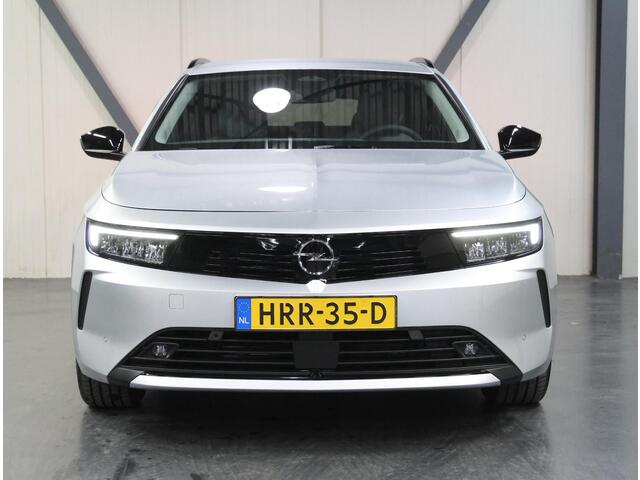 Opel ASTRA Sports Tourer 1.2 Business Edition 110PK | 1ste eigenaar | Navigatie | Climate Control | Adaptieve Cruise Control | Achteruitrijcamera | Parkeersensoren Voor + Achter | 16" Lichtmetalen Velgen | Verwarmbare Voorstoelen | Keyless Entry/Start | AppleCarplay