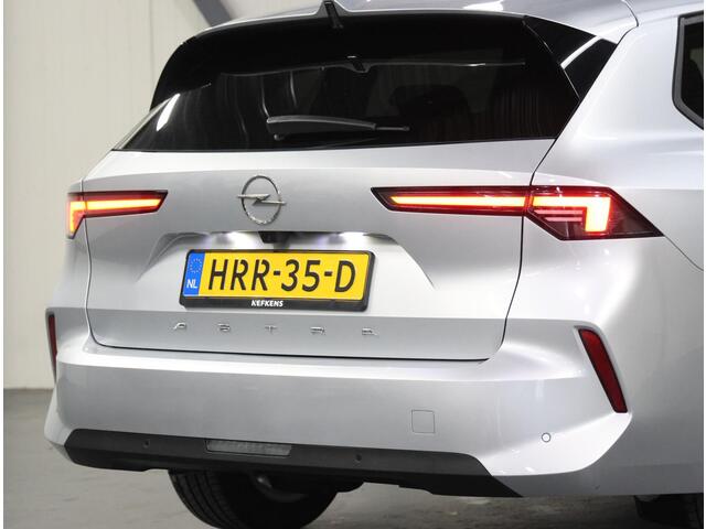 Opel ASTRA Sports Tourer 1.2 Business Edition 110PK | 1ste eigenaar | Navigatie | Climate Control | Adaptieve Cruise Control | Achteruitrijcamera | Parkeersensoren Voor + Achter | 16" Lichtmetalen Velgen | Verwarmbare Voorstoelen | Keyless Entry/Start | AppleCarplay