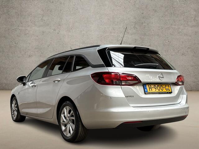 Opel ASTRA Sports Tourer 1.4 Sport 146Pk Automaat (APPLE CARPLAY, NAVIGATIE, CAMERA, CLIMATE, GETINT GLAS, SPORTSTOELEN, PARKEERSENSOREN, LM VELGEN, NIEUWE APK, NIEUWSTAAT)