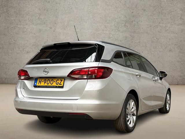 Opel ASTRA Sports Tourer 1.4 Sport 146Pk Automaat (APPLE CARPLAY, NAVIGATIE, CAMERA, CLIMATE, GETINT GLAS, SPORTSTOELEN, PARKEERSENSOREN, LM VELGEN, NIEUWE APK, NIEUWSTAAT)