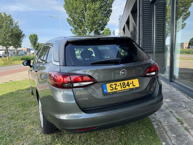 Opel ASTRA Sports Tourer 1.0 Online Edition Incl. 12M garantie en beurt incl! | 1e eigenaar | Carplay | Cruise | Climate control | NL Auto