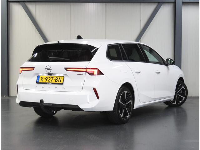 Opel ASTRA ST 180PK Hybrid | 1ste eigenaar | Trekhaak | Camera | Stuur/stoelverwarming | Adaptive Cruise Control | AppleCarPlay/Android | AUTOMAAT | Isofix | Privacy Glass | Parkeersensoren |
