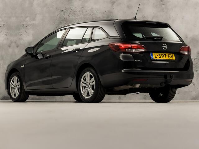Opel ASTRA Sports Tourer 1.2 Sport (APPLE CARPLAY, CAMERA, TREKHAAK, SPORTSTOELEN, PARKEERSENSOREN, CRUISE, LM VELGEN, NIEUWE APK, NIEUWSTAAT)