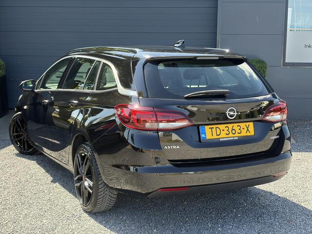 Opel ASTRA Sports Tourer 1.4 Business Executive 2e Eigenaar l 150pk l Carplay l Navi l Pdc V+A l Stoelvw-Stuurverw l Clima l Cruise l 18''Lmv l Halfleder l 6 Bak l Rijstrooksensor l N.A.P l Apk tot 08-2027