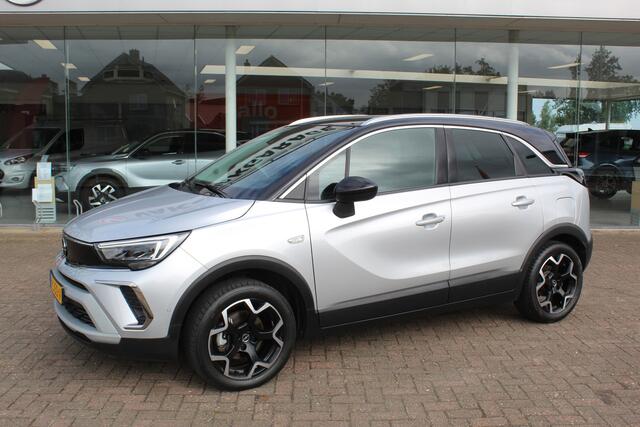 Opel Crossland 1.2-110pk Turbo 'Elegance'. Mooie en luxe hoogzitter met weinig km's ! Volautm. airco dual, cruise control, camera, comfortstoelen, metallic lak, LM wielen, navigatie, telefoonvoorb., lane- en side assist, parkeersensoren v+a, LED verlichting etc.