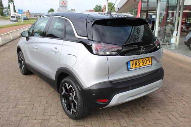 Opel Crossland 1.2-110pk Turbo 'Elegance'. Mooie en luxe hoogzitter met weinig km's ! Volautm. airco dual, cruise control, camera, comfortstoelen, metallic lak, LM wielen, navigatie, telefoonvoorb., lane- en side assist, parkeersensoren v+a, LED verlichting etc.