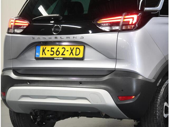 Opel Crossland 110PK Elegance | 1ste eigenaar | Camera | AppleCarplay/AndroidAuto | Navigatie | LED lampen | LEER/Stof | Climate Control | Cruise Control | Isofix | Privacy Glass | Parkeersensoren | Two-Tone |