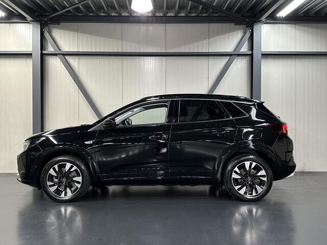 Opel Grandland 1.6 225PK Turbo Hybrid Level 3 | AUTOMAAT | AppleCarPlay/AndroidAuto | Adaptive Cruise Control | Camera | Stoel, Stuur & Voorruit verwarmd | AGR-Stoelen | Parkeersensoren | Trekhaak | Elektrisch Achterklep met Sensor | Isofix |
