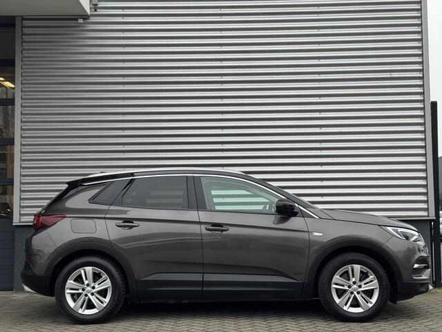 Opel Grandland X 1.6 HYbrid4 PHEV 300pk 4x4 e-EAT8 | NAPPA LEDER | TREKHAAK | ADAPTIVE CRUISE | 360° CAMERA | NAVI PRO | FULL LED | ISOFIX | KEYLESS | ELEK. A.KLEP |