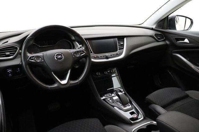 Opel Grandland X 1.6 Turbo 300pk Hybrid4 Elegance | Navigatie | Keyless | Camera | Parelmoer kleur | Electrische achterklep | Lichtmetalen velgen | AGR Comfortstoelen | Voorruitverwarming | Zwart dak