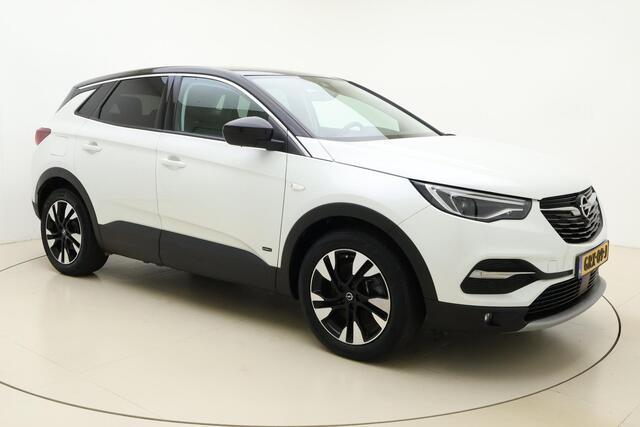 Opel Grandland X 1.6 Turbo 300pk Hybrid4 Elegance | Navigatie | Keyless | Camera | Parelmoer kleur | Electrische achterklep | Lichtmetalen velgen | AGR Comfortstoelen | Voorruitverwarming | Zwart dak