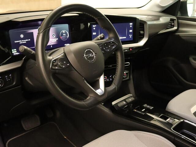 Opel MOKKA Mokka-e Level 3 50 kWh - SOH 99,8 % !!- NAVIGATIE - PARKEERSENSOREN VOOR/ ACHTER - TWO TONE LAK - 17 INCH LICHT METALEN VELGEN - DODEHOEK DETECTIE - KEYLESS ENTRY/ START - LICHT/ REGENSENSOR - CAMERA