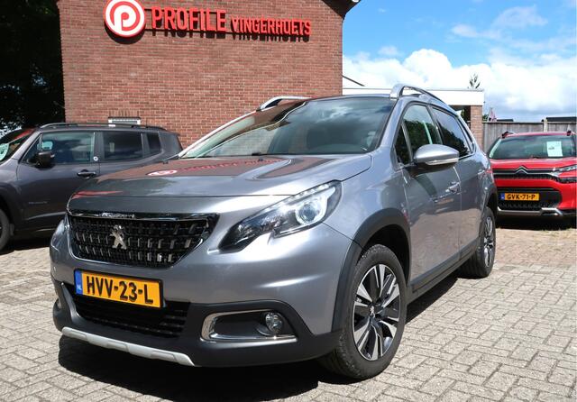 Peugeot 2008 1.2 Benzine * Hele Luxe Allure * Hoge Zit * Navigatie * Panoramadak * 1/2 Leder Interieur * Achteruitrij Camera * Climate & Cruise Control * Vingerhoets; Vierde Generatie Eersteklas Service !