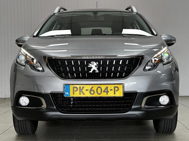 Peugeot 2008 1.2 PureTech Blue Lion/ D-Riem verv: 109.000 KM!/ Apple + Android/ DAB+/ Navi/ Airco/ Cruise/ Elek. pakket/ Isofix/ Bluetooth/ Multi. LEDER. Stuur/ Mistl./ PDC/ LED Dagrijverl./ Dakrails.