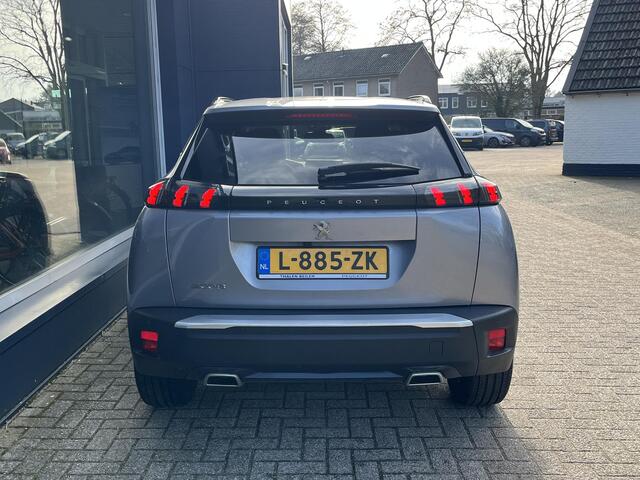 Peugeot 2008 1.2 Turbo 130 PK Allure Pack | 1e Eigenaarsauto met slechts 35.500 KM | Hoge Zitpositie | Navigatie | Climate Control | Keyless Entry | Draadloze Telefoonlader | Digitaal Dashboard | Camera | Parkeersensoren V+A | LED Verlichting | 17" Lichtmetalen Velgen