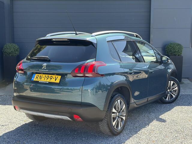 Peugeot 2008 1.2 PureTech Allure D-riem vv in 02-2026 l Pano l Carplay l Camera l Halfleder l 110pk l Dealer Onderhouden l 2e Eigenaar l Navi l Clima l Cruise l Pdc l Lm velgen l Apk tot 02-2027
