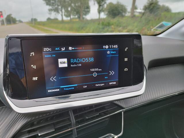 Peugeot 208 1.2 Style ** 5 DRS ** Airco ** Cruise ** LM velgen ** PDC ** NAVI APP **