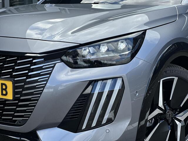 Peugeot 208 Hybrid 136 e-DCS6 GT | Parkeercamera/-sensoren (voor/achter) | Keyless Entry/Start | Dodehoek | Sfeerverlichting | Climate Control | Draadloze telefoonlader | Apple Carplay/Android Auto | Adaptive Cruise Control |