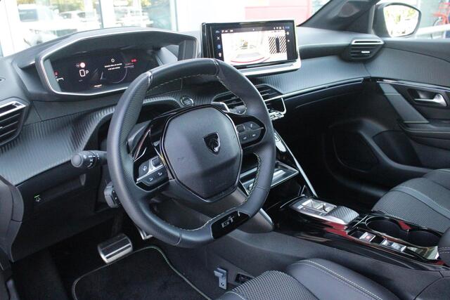 Peugeot 208 1.2 Hybrid 145PK AUTOMAAT GT | CAMERA VOOR + ACHTER | NAVIGATIE | DRAADLOZE APPLE CARPLAY/ANDROID AUTO | FULL LED KOPLAMPEN | LICHTMETALEN VELGEN 17" | DODEHOEK DETECTIE | DRAADLOZE TELEFOONLADER | KEYLESS ENTRY/START | DAB+ RADIO | ADAPTIVE CRUISE CONTRO