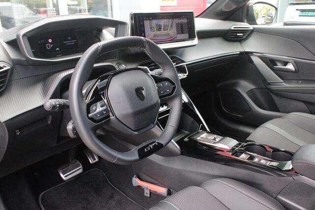 Peugeot 208 1.2 Hybrid 145PK AUTOMAAT GT | CAMERA VOOR + ACHTER | NAVIGATIE | DRAADLOZE APPLE CARPLAY/ANDROID AUTO | FULL LED KOPLAMPEN | LICHTMETALEN VELGEN 17" | DODEHOEK DETECTIE | DRAADLOZE TELEFOONLADER | KEYLESS ENTRY/START | DAB+ RADIO | ADAPTIVE CRUISE CONTRO