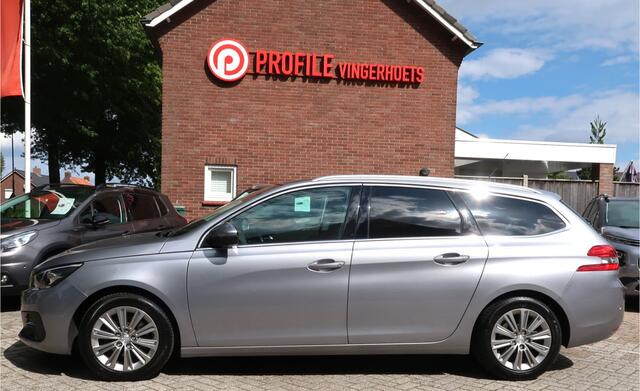 Peugeot 308 SW 130 Pk Premium Allure SW Benzine Zwart Lederen Bekleding * Elektrisch en Verwarmde Stoelen met Massage * Panoramadak * Achteruitrij Camera * Dodehoekdetectoren * L.M. Velgen * Navigatie * Climate & Cruise Control * Vingerhoets; Vierde Generatie Eerstek