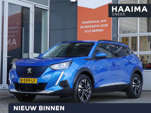 Peugeot e-2008 EV Allure 50 kWh | Stoelverwarming | Lichtmetalen velgen | Parkeersensoren | Cruise control | Climate control | Keyless entry & start | Navigatie | Led