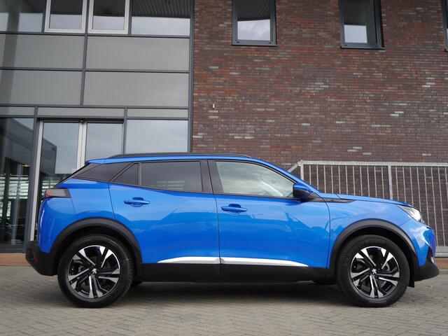 Peugeot e-2008 EV Allure 50 kWh | 3 Fase | Adaptieve cruise control | Draadloze telefoonlader | Stoelverwarming | Navigatie | Achteruitrijcamera | Lichtmetalen velgen | Apple carplay/Android auto