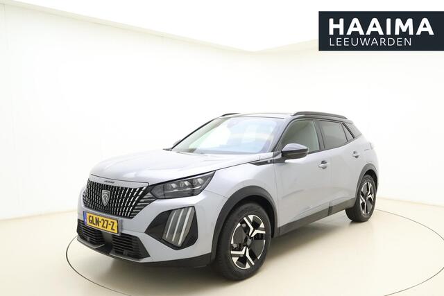 Peugeot e-2008 EV GT 54 kWh | Achteruitrijcamera | Parkeersensoren | Adaptive cruise control | Wireless charging | Navigatie | Airco | Climate control | Stuurbediening | Interieurverlichting | Half stof/leer bekleding | Verkeersbord detectie