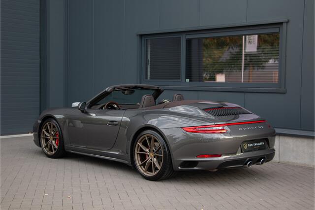 Porsche 911 Cabrio 3.0 Carrera 4S 420PK | Lift | Sportuitlaat | Achterasbesturing | Ventilatie | Bose | Sport Chrono | Memory | Stuurverwarming | Camera | NL Auto (nap) | Keyless | Alarm | Dealer OH. ¤196.844,- Nieuwprijs