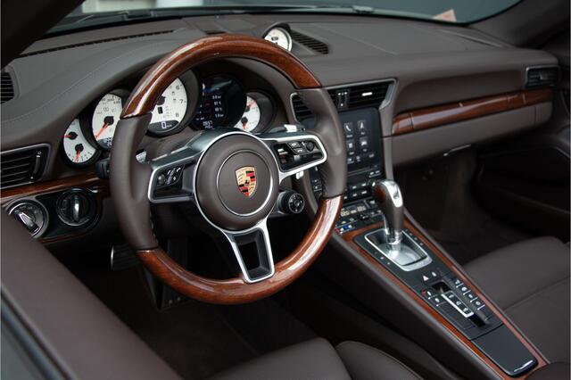 Porsche 911 Cabrio 3.0 Carrera 4S 420PK | Lift | Sportuitlaat | Achterasbesturing | Ventilatie | Bose | Sport Chrono | Memory | Stuurverwarming | Camera | NL Auto (nap) | Keyless | Alarm | Dealer OH. ¤196.844,- Nieuwprijs