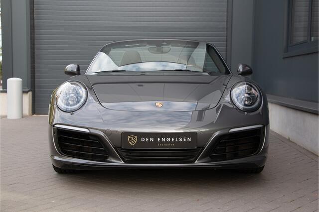 Porsche 911 Cabrio 3.0 Carrera 4S 420PK | Lift | Sportuitlaat | Achterasbesturing | Ventilatie | Bose | Sport Chrono | Memory | Stuurverwarming | Camera | NL Auto (nap) | Keyless | Alarm | Dealer OH. ¤196.844,- Nieuwprijs