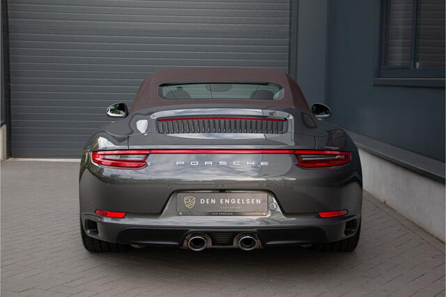 Porsche 911 Cabrio 3.0 Carrera 4S 420PK | Lift | Sportuitlaat | Achterasbesturing | Ventilatie | Bose | Sport Chrono | Memory | Stuurverwarming | Camera | NL Auto (nap) | Keyless | Alarm | Dealer OH. ¤196.844,- Nieuwprijs