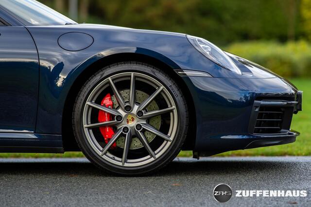 Porsche 911 Cabrio 3.0 Carrera 4S Bose Chrono achterasbesturing Nachtblauw stoelventilatie adapt Cruise