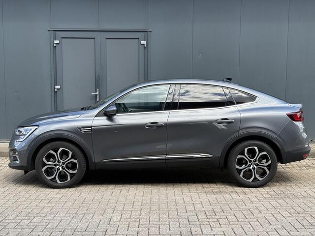 Renault Arkana 1.6 E-Tech Hybrid 145 Intens / All Season Banden / Adaptieve Cruise Control / Achteruitrijcamera / Navigatie / Dodehoek Detectie