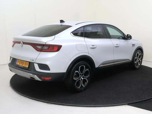 Renault Arkana 1.6 E-Tech Hybrid 145 Intens | Apple Carplay/Android Auto | Autonomous Emergency Braking | cruise control adaptief | dodehoek detectie | electronic climate control | lederen/stof bekleding | LED koplampen | lichtmetalen velgen 18" | navigatiesysteem |