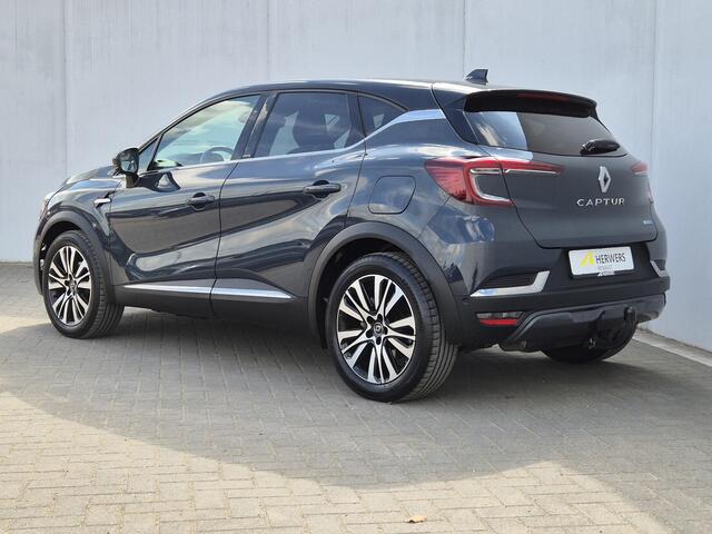 Renault CAPTUR 1.6 E-Tech Plug-in Hybrid 160 Initiale Paris / Automaat / Trekhaak afneembaar 13-polig / Apple Carplay Android Auto / Bose Premium Audio / Stuur-, en Stoelverwarming / Rondomzicht camera / Keyless Entry/Start /