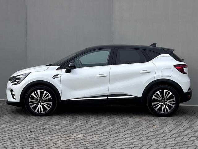 Renault CAPTUR E-TECH Plug-in 160 Hybrid Initiale Paris Automaat / Dealer onderhouden / Leder / Stuur- en stoelverwarming / Navigatie groot scherm / Apple Carplay Android / Camera / 18" LM wielen /