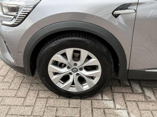 Renault CAPTUR 1.6 E-Tech Plug-in Hybrid 160 Intens | elektrisch glazen schuif-/kanteldak | 360 graden camera | Stoelverwarming | Park assist | Navigatie |